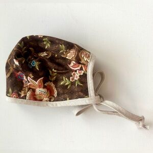 Girl’s Floral Brown Bonnet with Ties.